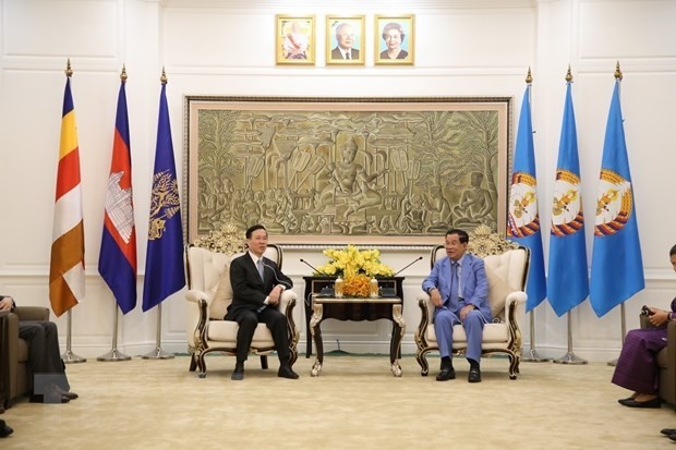 Party official meets with Cambodian leaders during visit to Cambodia