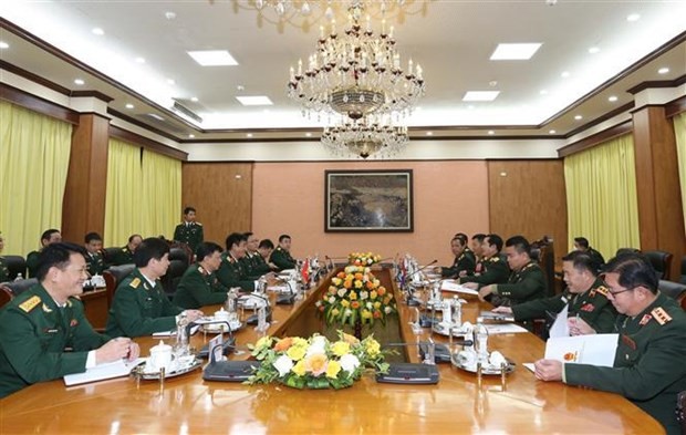 Vietnam, Laos step up practical cooperation in defence