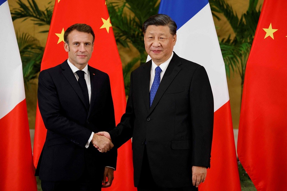 (11.15) Chủ tịch Trung Quốc Tập Cận Bình và Tổng thống Pháp Emmanuel Macron trong cuộc gặp ngày 15/11. (Nguồn: AFP)
