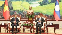 Chánh Văn phòng Trung ương Đảng Cộng sản Việt Nam thăm và làm việc tại Lào