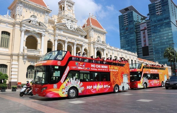 The Hop-on-Hop-off bus carries tourists to Ho Chi Minh City’s well-known attractions. (Source: VNA)