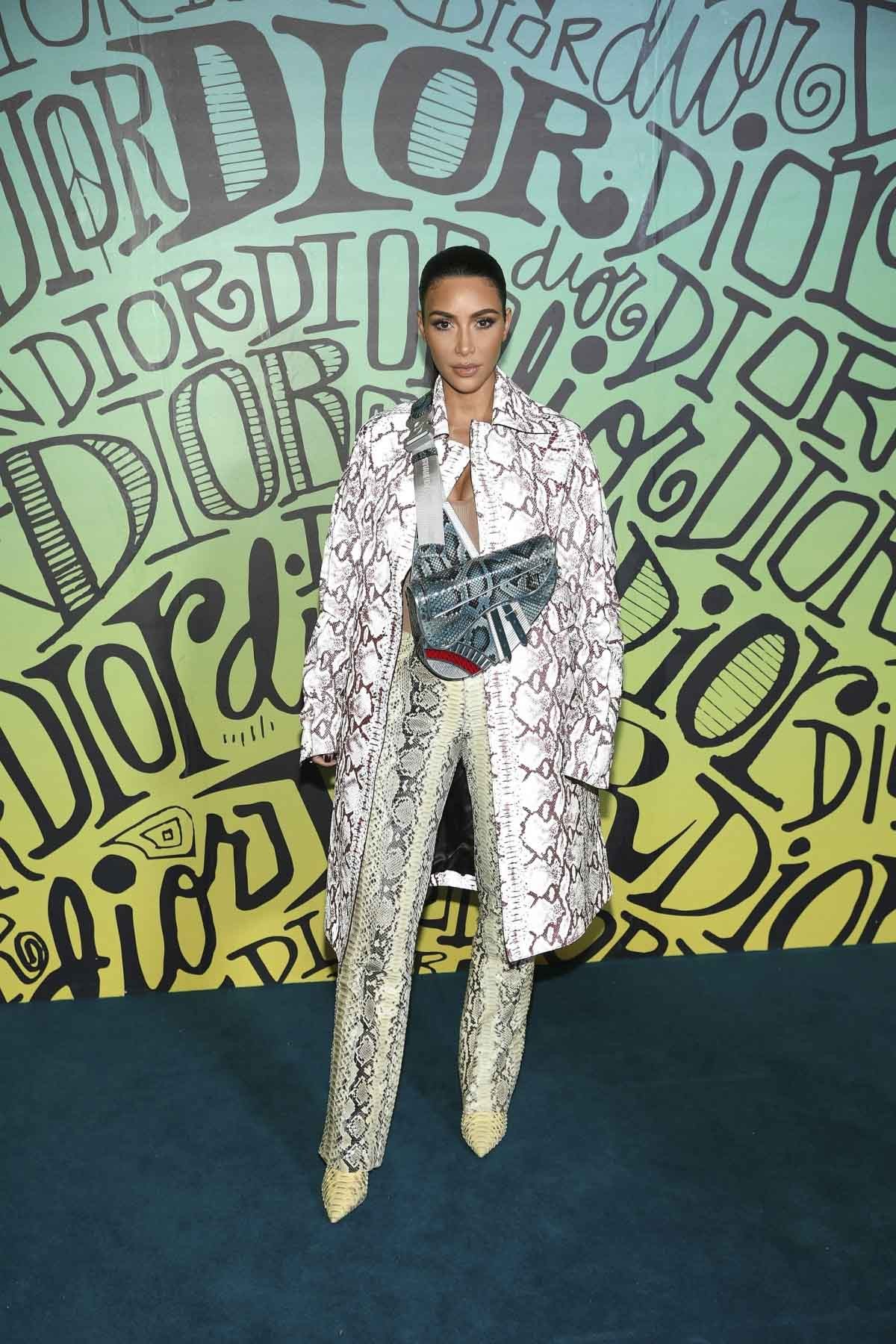 Billionaire Kim Kardashian 'shows off' her expensive designer handbag collection