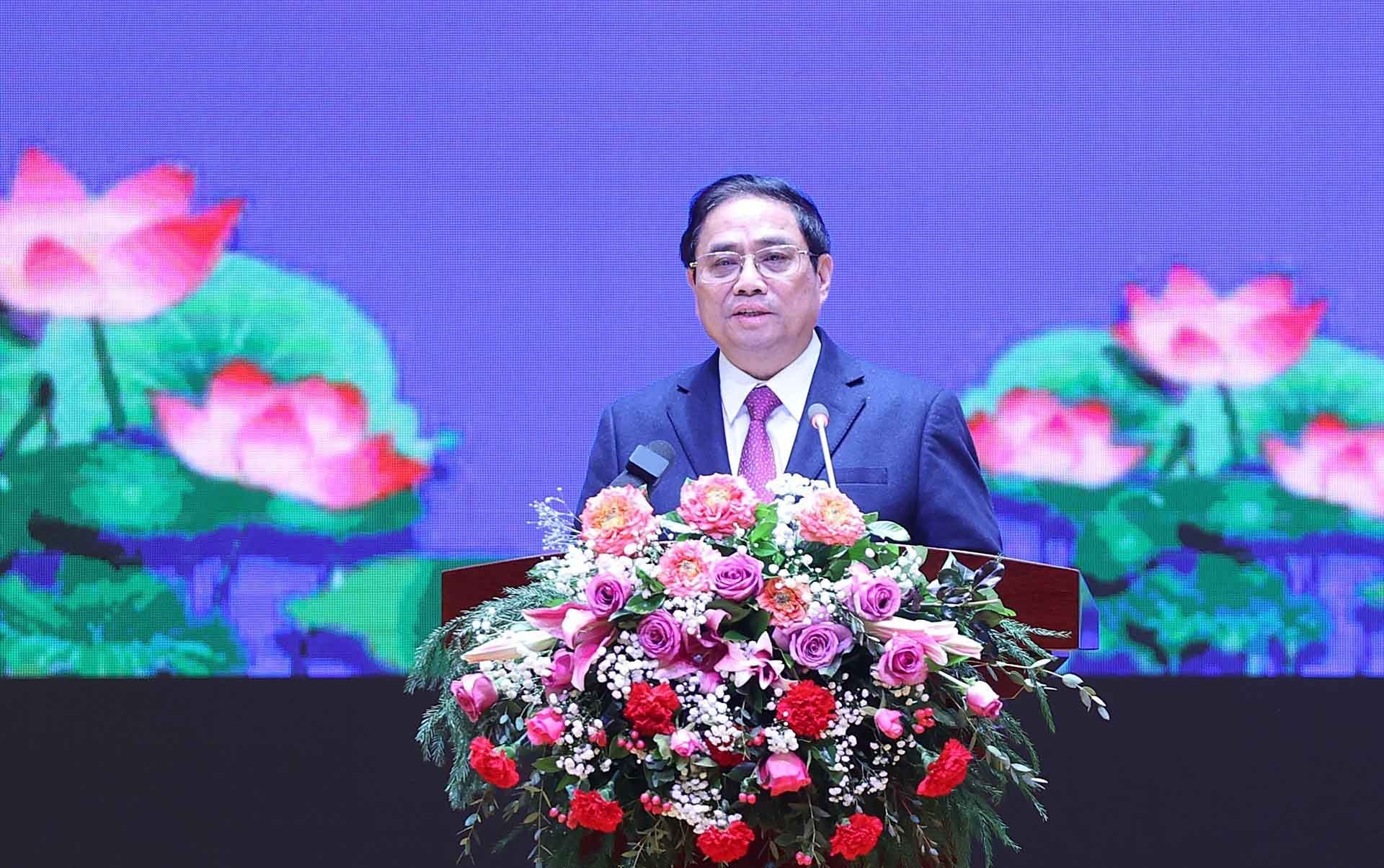Thủ tướng Phạm Minh Chính phát biểu tại Lễ tổng kết Năm Đoàn kết hữu nghị Việt Nam-Lào, Lào-Việt Nam 2022. (Nguồn: TTXVN)