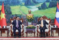 Thủ tướng Phạm Minh Chính chào Tổng Bí thư, Chủ tịch nước Lào Thongloun Sisoulith