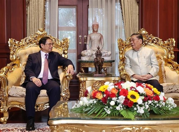 Prime Minister Pham Minh Chinh visits former leaders of Laos