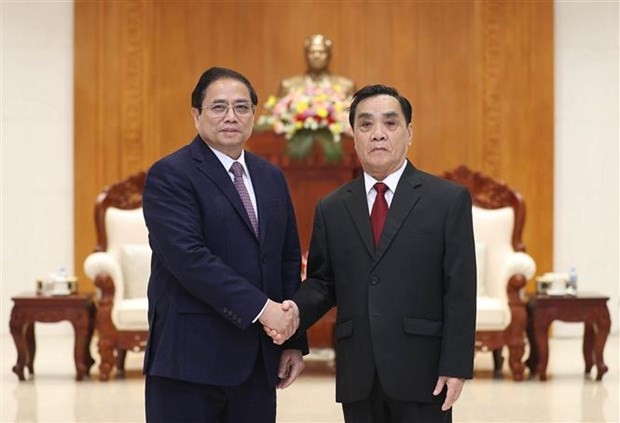 Prime Minister Pham Minh Chinh visits former leaders of Laos