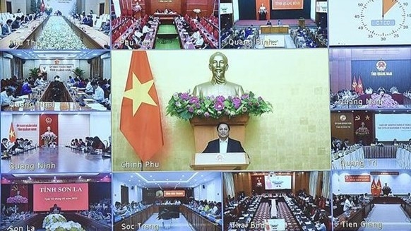 Prime Minister Pham Minh Chinh chairs monthly teleconference with localities