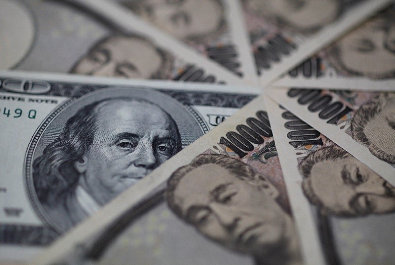 Tỷ giá ngoại tệ hôm nay 8/2/2023: Tỷ giá USD, Euro, Yen Nhật, CAD, AUD, Bảng Anh... Đồng bạc xanh nghỉ chân, giảm nhẹ. Euro vững, Yen tăng. (Nguồn: Reuters)