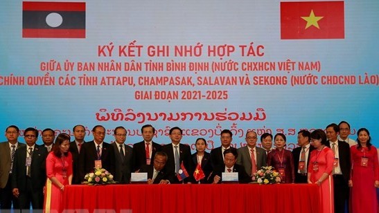 Binh Dinh signs cooperation agreement with four southern Lao localities