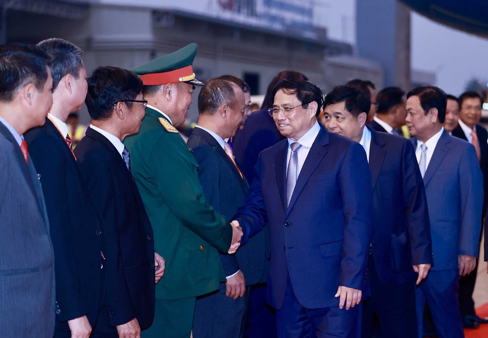 Lễ đón Thủ tướng Phạm Minh Chính dự Hội nghị cấp cao Ủy hội sông Mekong quốc tế lần thứ 4 tại Vientiane, Lào. (Nguồn: TTXVN)