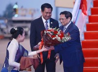 Prime Minister Pham Minh Chinh arrives in Laos for 4th MRC Summit