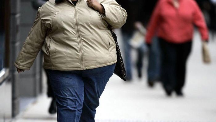Thừa cân, béo phì và lười vận động gây tổn hại cho sức khỏe nhiều hơn so với thuốc lá. (Nguồn: AFP)