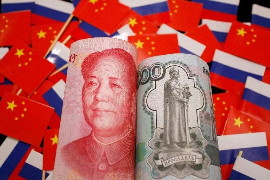 USD ‘độc tôn’ đang bị vũ khí hóa, cuộc chơi của Nga với đồng NDT và cơ hội nào cho Trung Quốc? (Nguồn: Reuters)