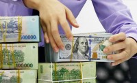 Báo Mỹ: Vị thế của VND được cải thiện, dự trữ ngoại hối sẽ tăng lên 95 tỷ USD