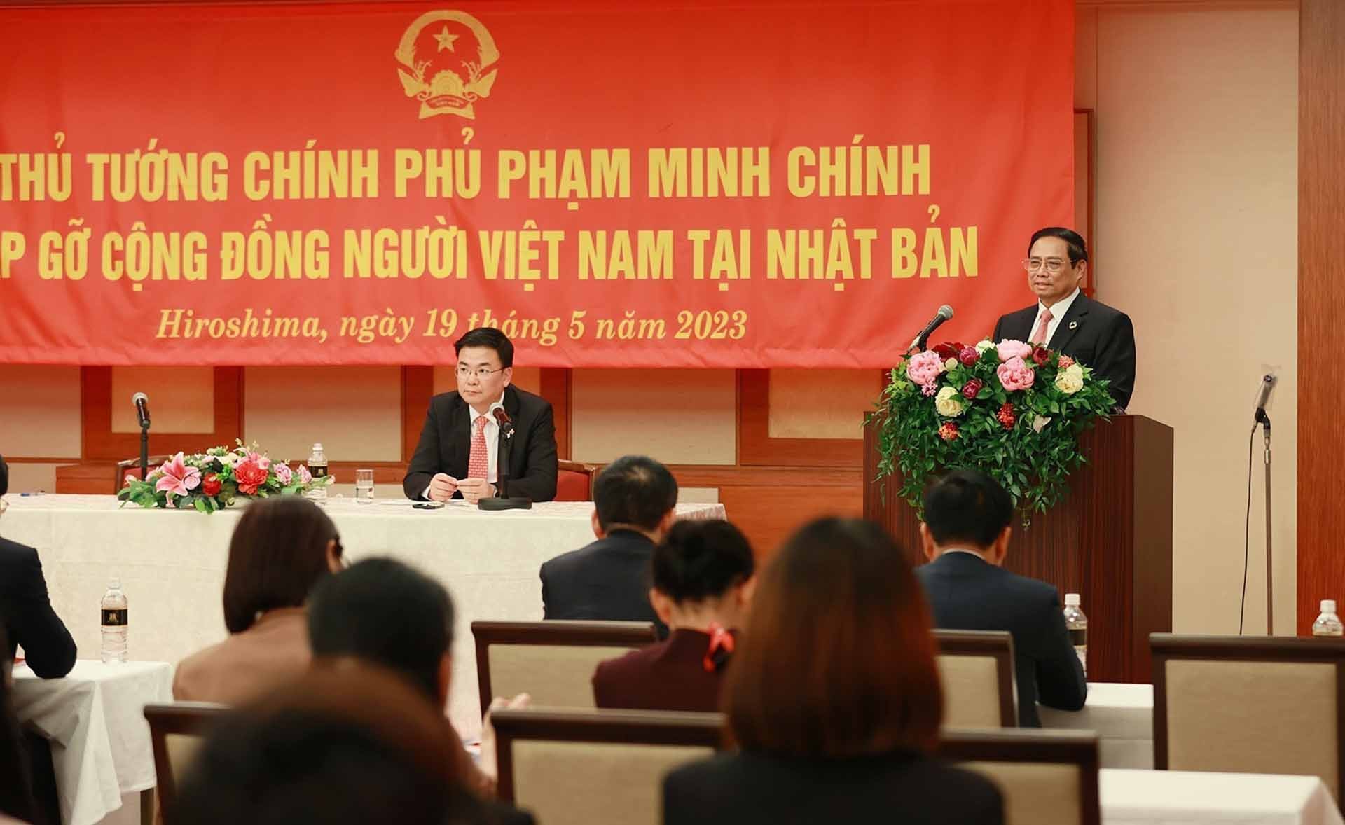 Thủ tướng Phạm Minh Chính phát biểu tại buổi gặp cộng đồng người Việt Nam tại Nhật Bản. (Nguồn: TTXVN)