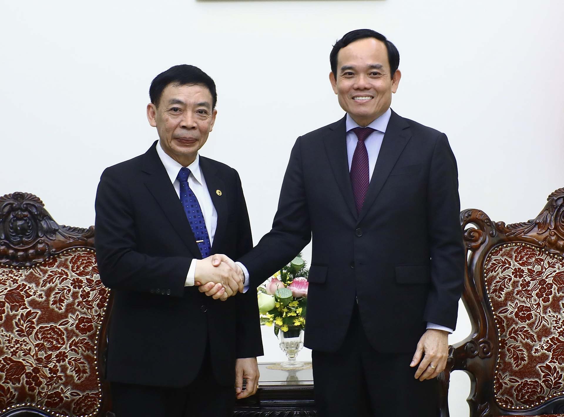 Phó Thủ tướng Trần Lưu Quang tiếp Bộ trưởng Bộ Nội vụ Lào Thongchanh Manixay. (Nguồn: TTXVN)