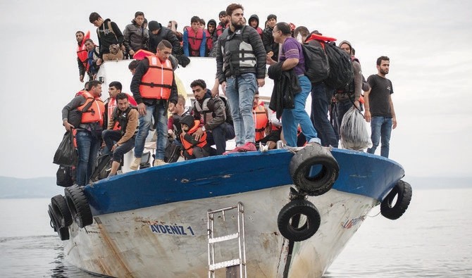 Năm sĩ quan cảnh sát Hy Lạp bị cáo buộc hợp tác với những kẻ buôn người để tạo điều kiện cho ít nhất 100 người di cư vào Hy Lạp đang bị giam giữ chờ xét xử. (Nguồn: Reuters)