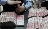 Bất chấp nỗ lực của Bắc Kinh, đồng NDT còn xa mới đủ sức 'soán ngôi' đồng USD