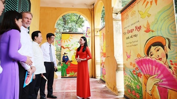 Re-enaction of traditional celebration of Doan Ngo festival in Hanoi