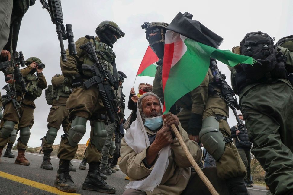 Israel cam kết vạch trần thủ phạm tấn công ở Bờ Tây, cáo buộc nhóm tin tặc có liên hệ Iran phá hoại không gian mạng