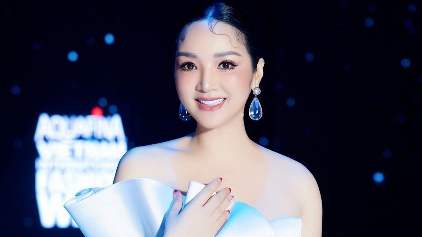 Hoa hậu Giáng My kiều diễm với đầm trắng trễ vai