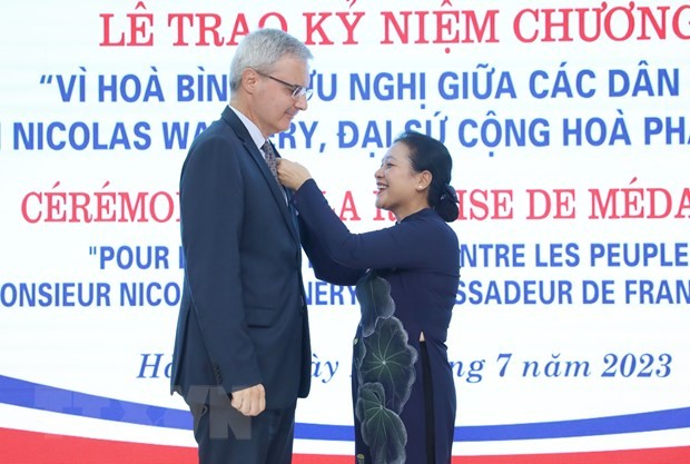 Friendship medal presented to French Ambassador Nicolas Warnery