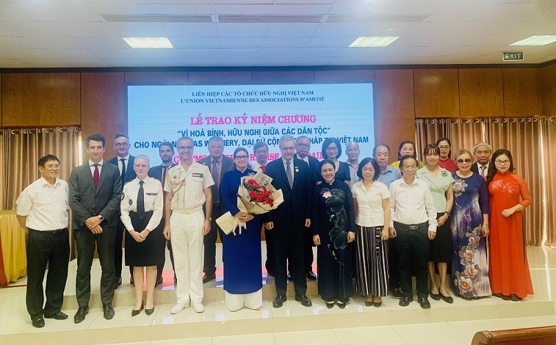 Friendship medal presented to French Ambassador Nicolas Warnery