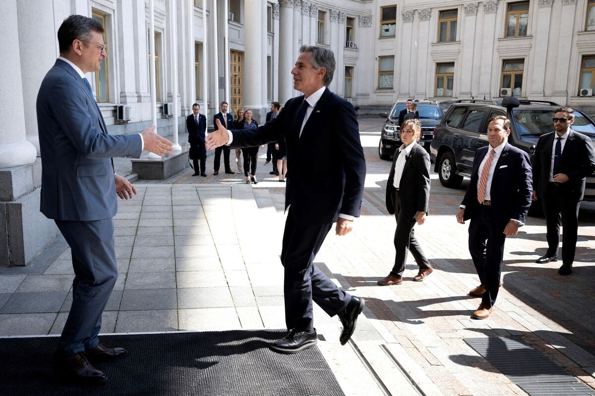 Dmytro Kuleba, left, greets Antony Blinken in Kyiv on Sept. 6.Photographer: Brendan Smialowski/AFP/Getty Images