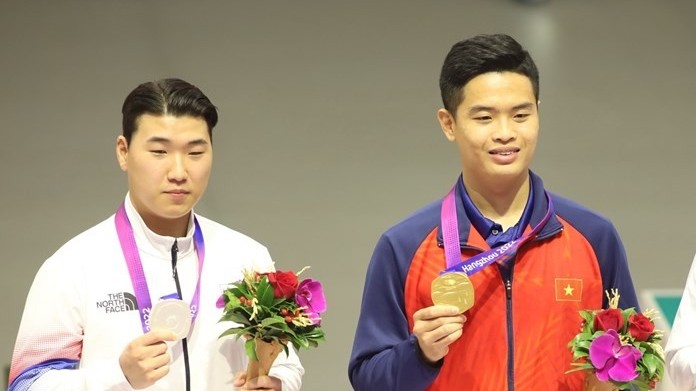 ASIAD 19: VĐV môn bắn súng Phạm Quang Huy mang Huy chương vàng đầu tiên cho đoàn thể thao Việt Nam
