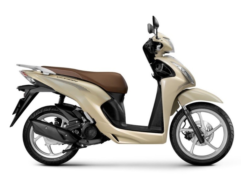 Honda Vision phiên bản cổ điển màu vàng đen bạc.