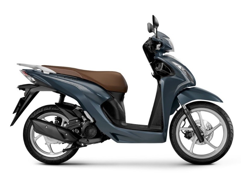 Honda Vision phiên bản cổ điển xanh đen bạc.