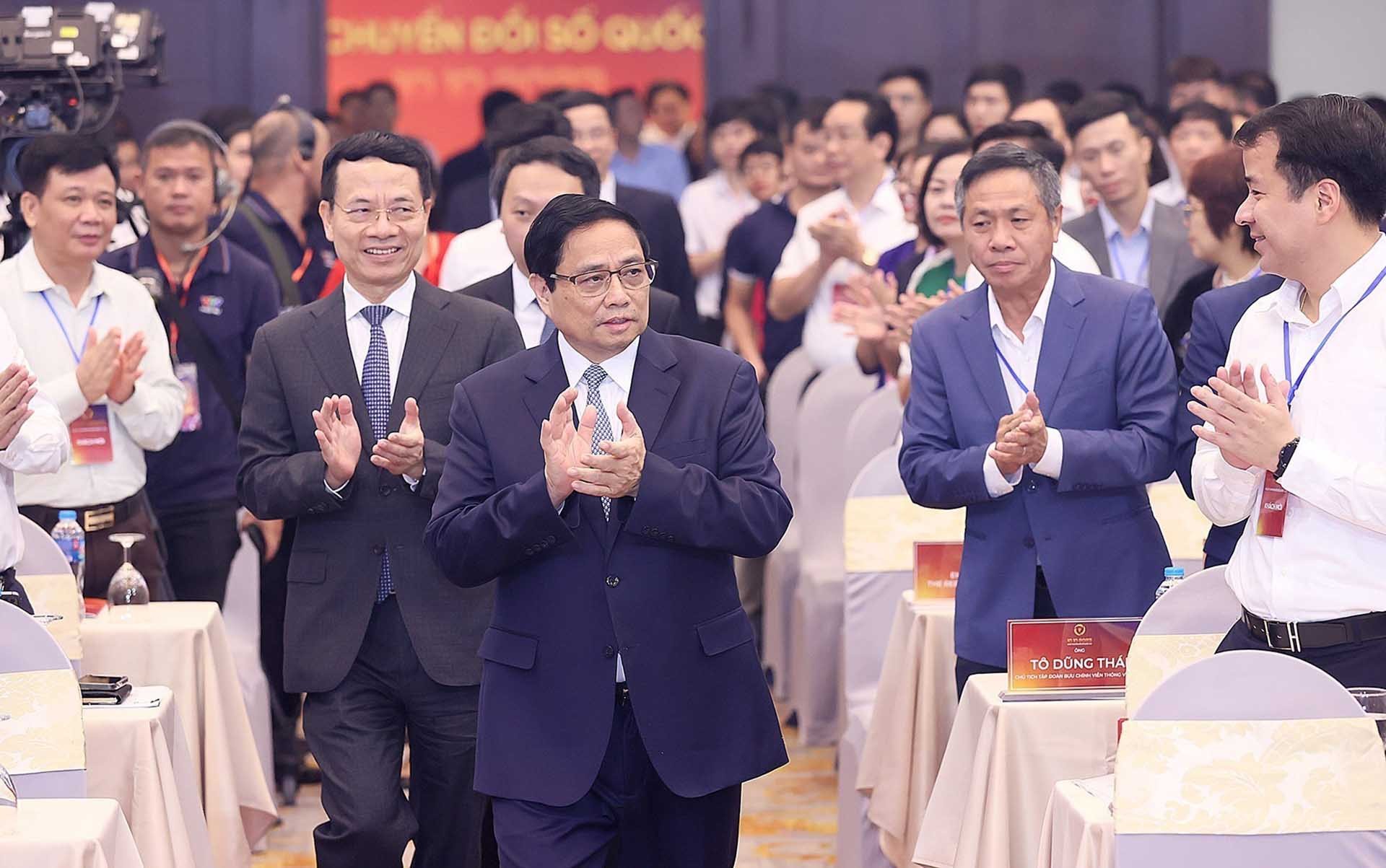 Thủ tướng Phạm Minh Chính đến dự Ngày Chuyển đổi số quốc gia (10/10). (Nguồn: TTXVN)