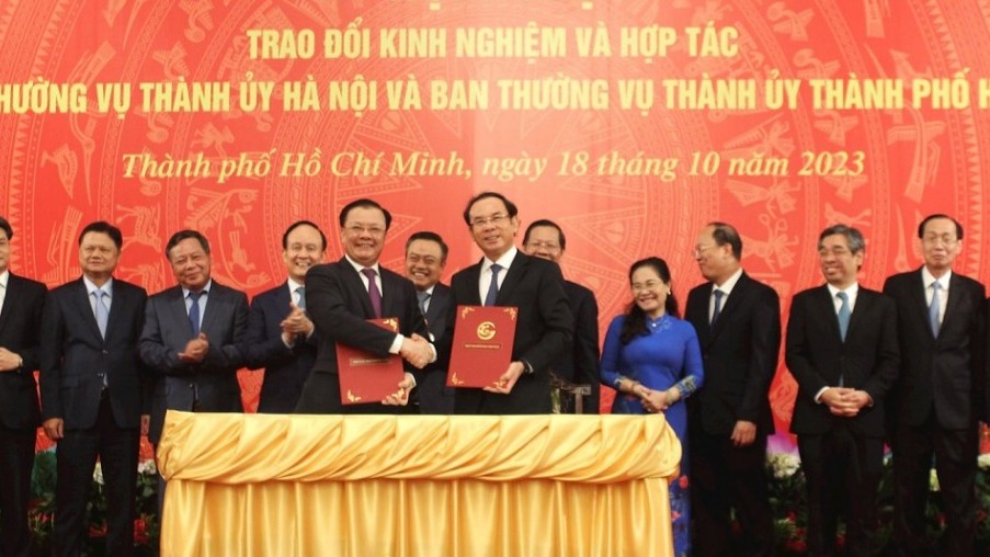 Thành phố Hồ Chí Minh và Hà Nội trao đổi kinh nghiệm, hợp tác toàn diện trên các lĩnh vực