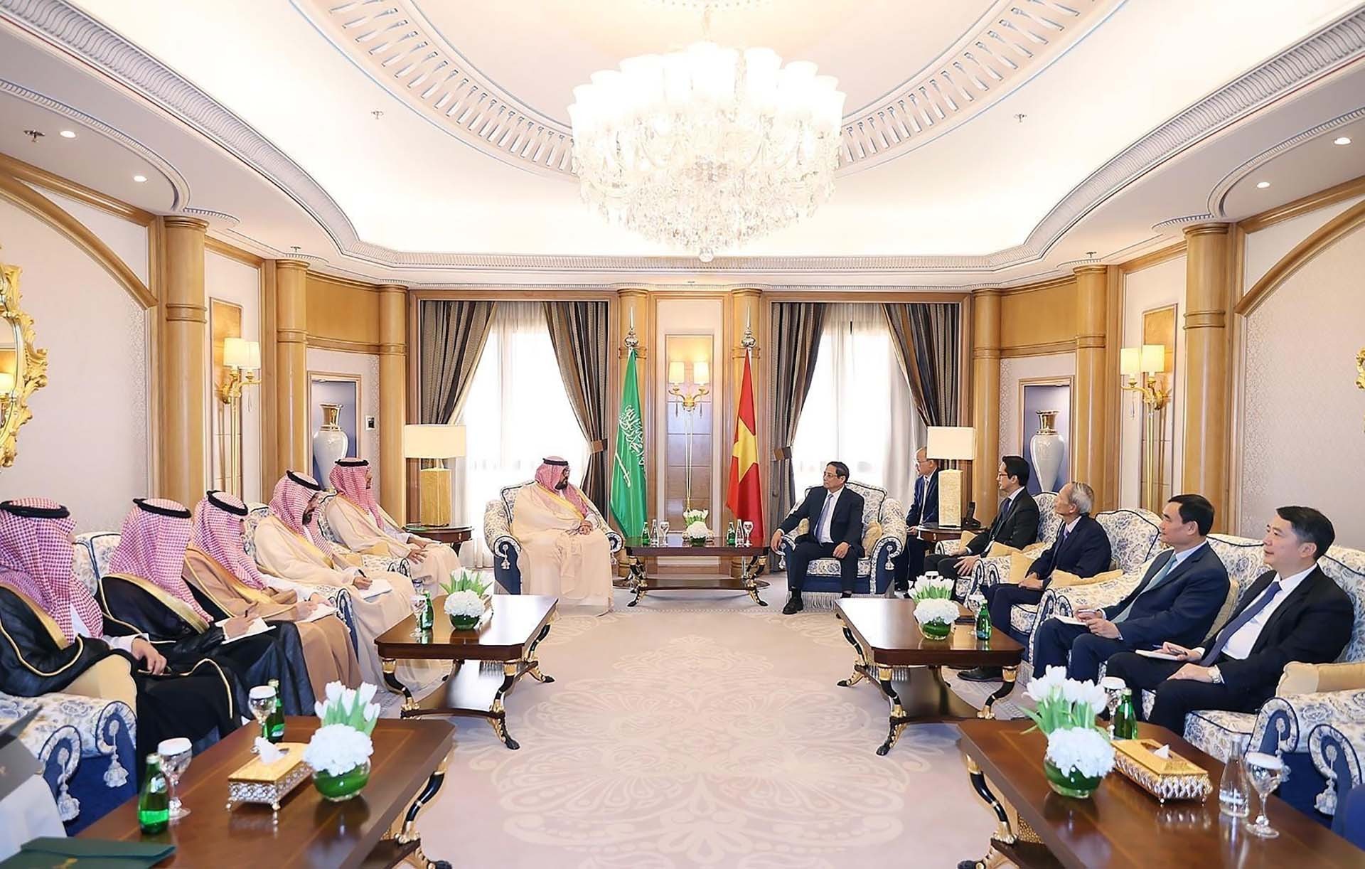 Thủ tướng Phạm Minh Chính tiếp Bộ trưởng Kinh tế và kế hoạch Saudi Arabia Faisal bin Fadhil Al-Ibrahim. (Nguồn: TTXVN)