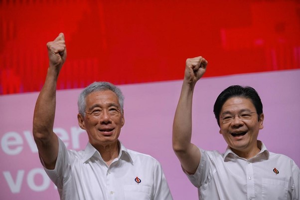 Thủ tướng Singapore Lý Hiển Long và Phó Thủ tướng Lawrence Wong tại Hội nghị thường niên của Đảng Hành động Nhân dân (PAP) cầm quyền tại Trung tâm Triển lãm hội nghị Singapore Expo ngày 5/11/2023. (Nguồn: Straits Times)