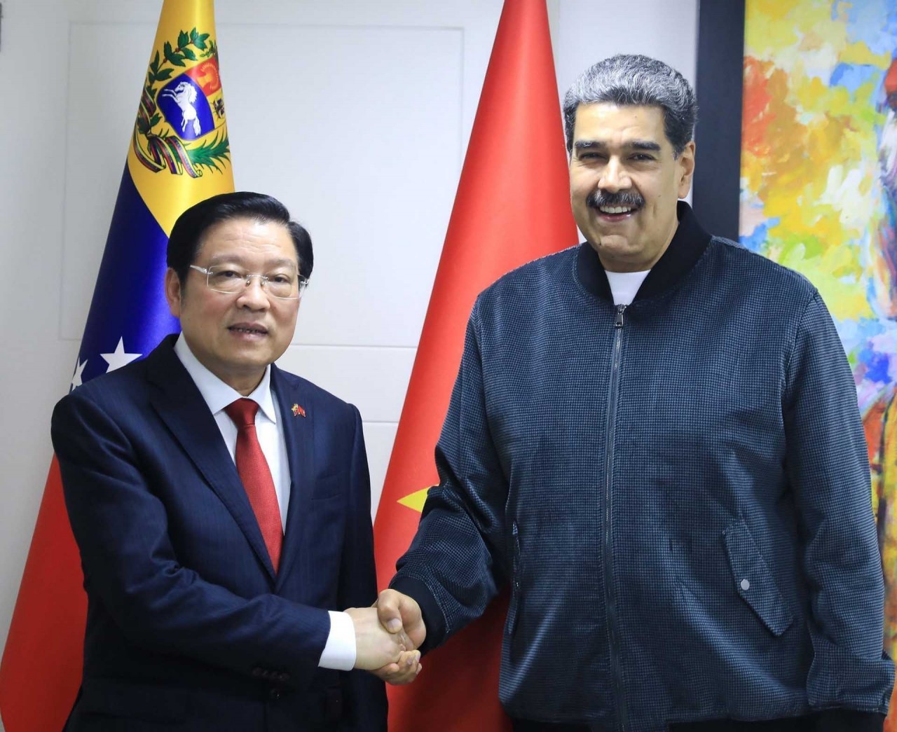 Đồng chí Phan Đình Trạc hội kiến Chủ tịch Đảng PSUV, Tổng thống Venezuela Nicolás Maduro. (Nguồn: TTXVN)