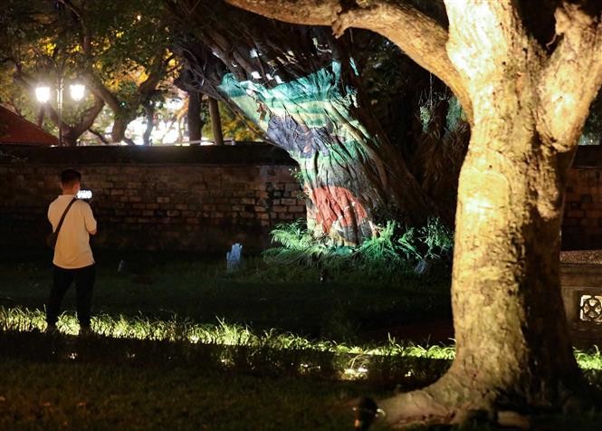 Night tour at the Temple of Literature introduces modern lighting system and 3D light mapping. VNA Photo