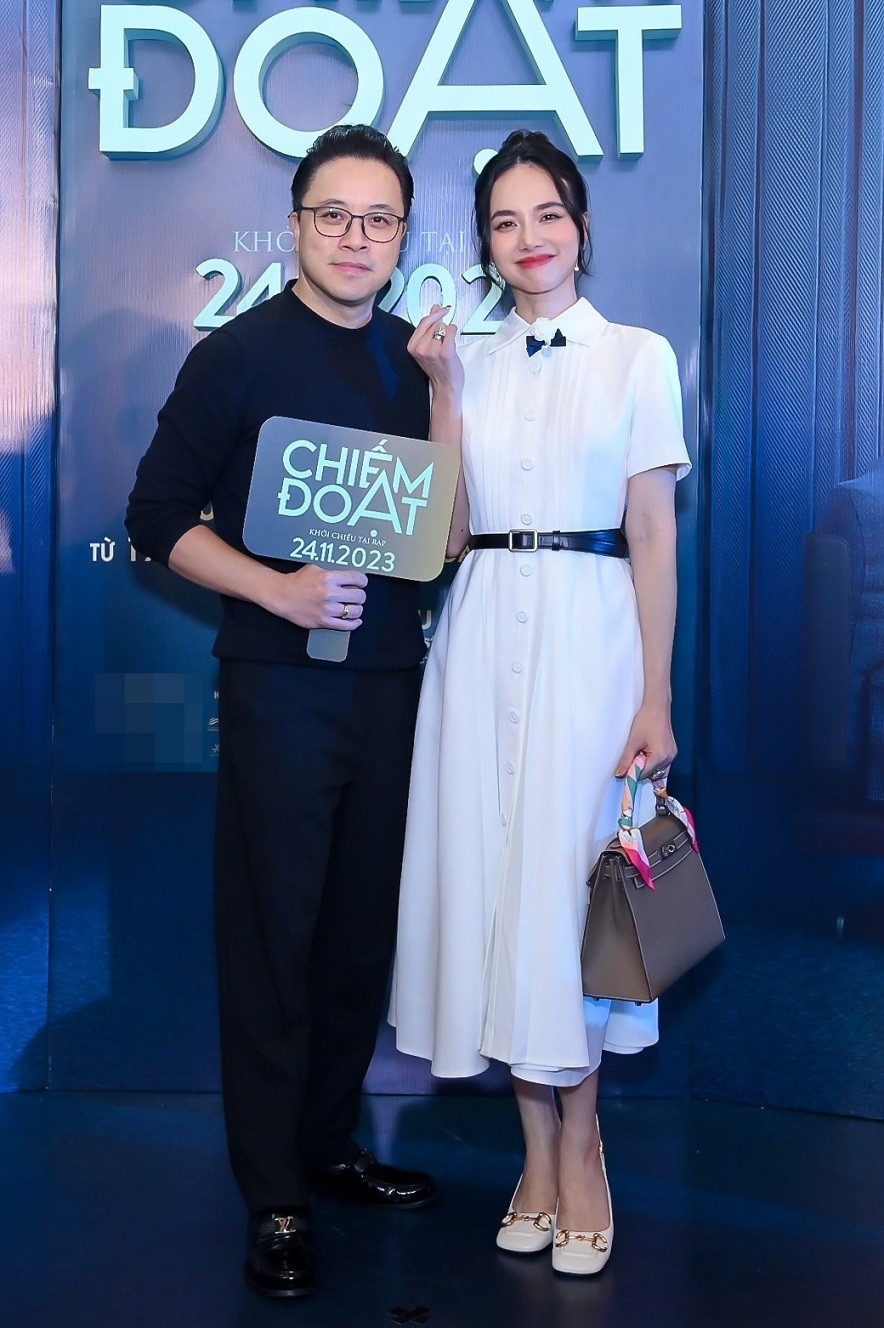 Vợ chồng đạo diễn Victor Vũ - diễn viên, nhà sản xuất Đinh Ngọc Diệp đến xem phim của các đồng nghiệp. 