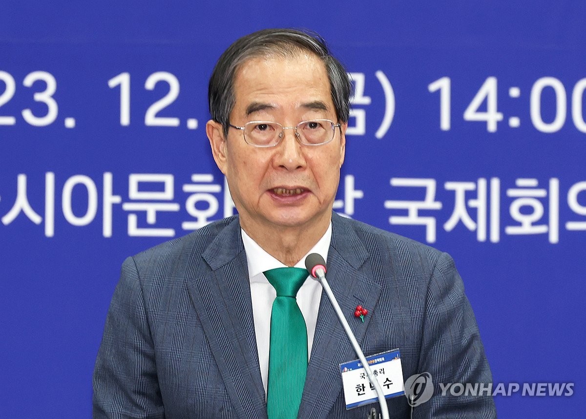 (12.09) Thủ tướng Hàn Quốc Han Duck Soo phát biểu tại Hội nghị về 'Chiến lược đổi mới xuất khẩu du lịch của Hàn Quốc'. (Nguồn: Yonhap)