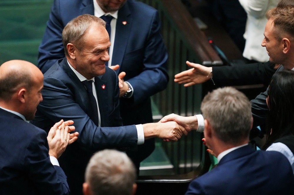 (12.12) Ông Donald Tusk ăn mừng sau khi Hạ viên Ba Lan phê chuẩn đề xuất lập chính phủ mới do chính trị gia này lãnh đạo ngày 12/12. (Nguồn: Reuters)