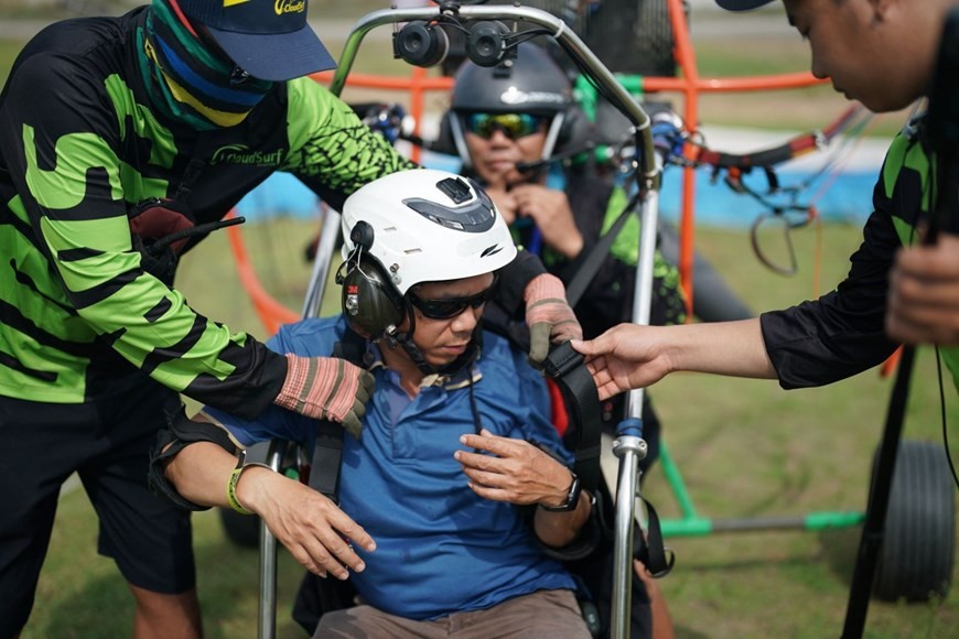 Admiring Ho Chi Minh City while paragliding