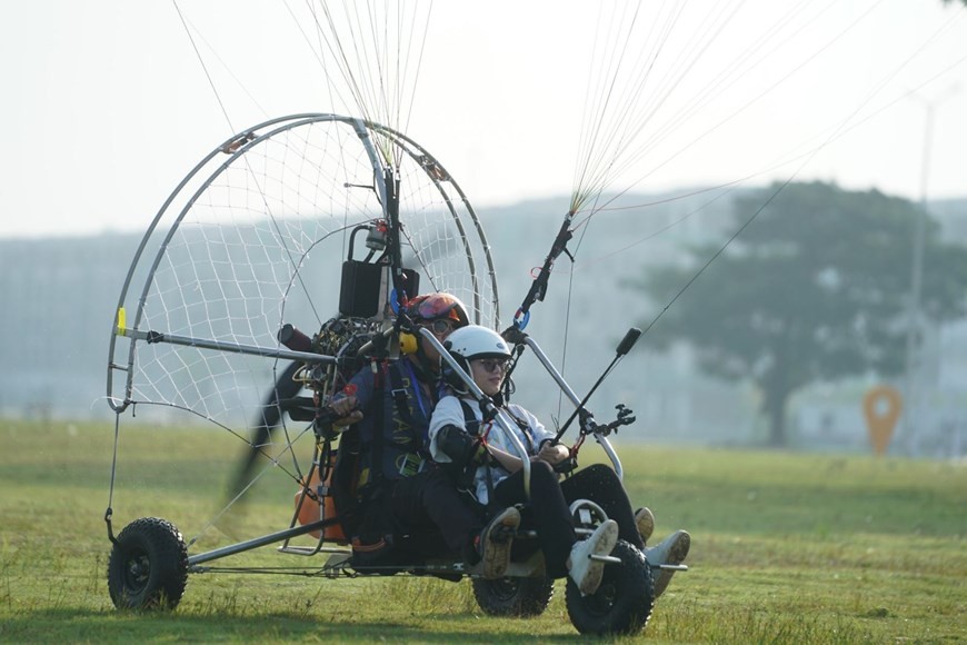 Admiring Ho Chi Minh City while paragliding