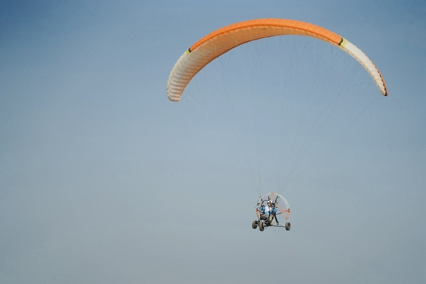 Admiring Ho Chi Minh City while paragliding