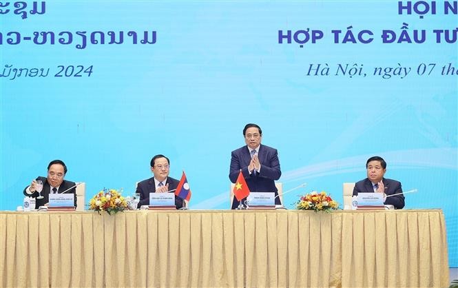 Thủ tướng Phạm Minh Chính dự Hội nghị hợp tác đầu tư Việt Nam – Lào 2024. Ảnh: Dương Giang-TTXVN