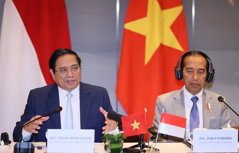 Thủ tướng Phạm Minh Chính phát biểu tại cuộc gặp doanh nghiệp hai nước. TTXVN