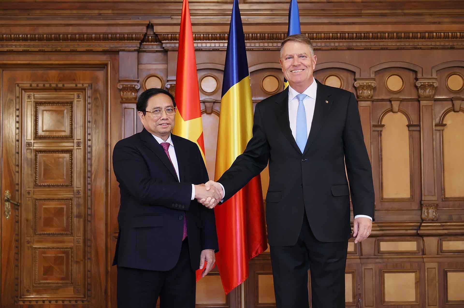 Thủ tướng Phạm Minh Chính hội kiến Tổng thống Romania Klaus Iohannis. (Nguồn: TTXVN)
