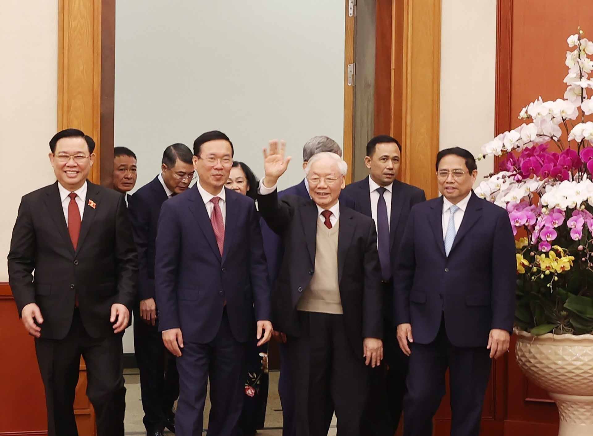 Tổng Bí thư Nguyễn Phú Trọng cùng các đồng chí lãnh đạo Đảng và Nhà nước dự chúc Tết. (Nguồn: TTXVN)