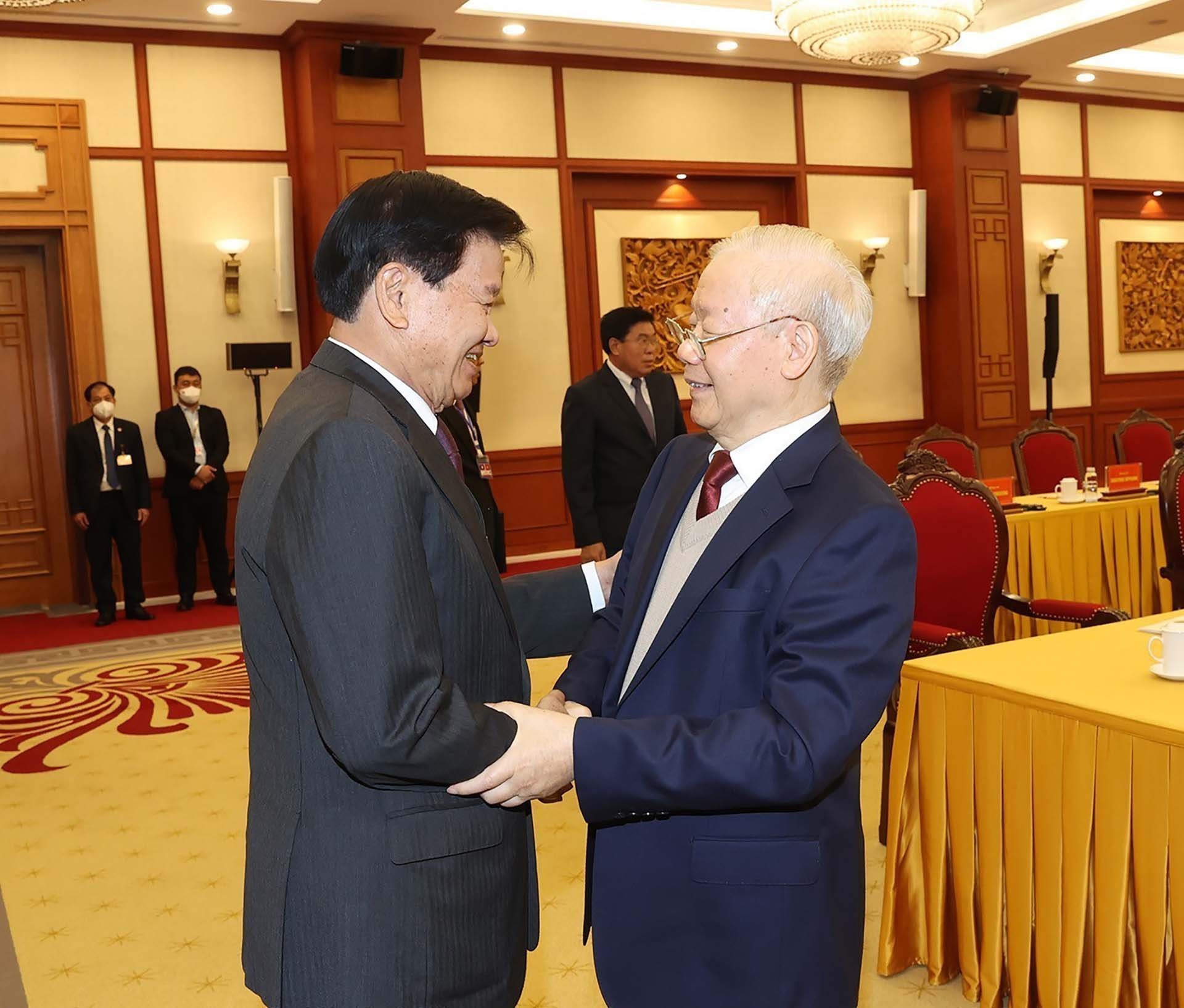 Tổng Bí thư Nguyễn Phú Trọng đón Tổng Bí thư, Chủ tịch nước Lào Thongloun Sisoulith. (Nguồn: TTXVN)