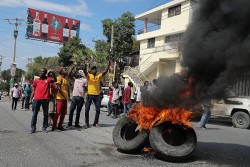 Haiti hỗn loạn vì xung đột vũ trang, thủ lĩnh băng G9 dọa lật đổ chính phủ, Thủ tướng ra cam kết bầu cử