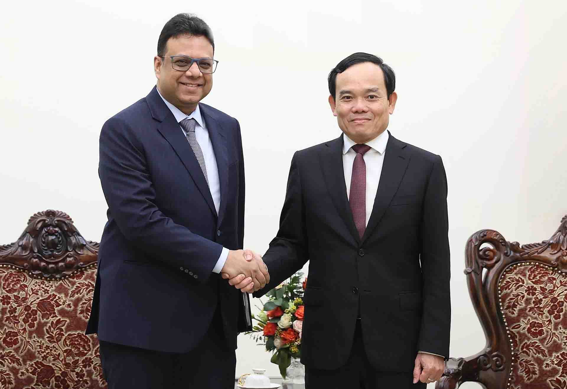 Phó Thủ tướng Trần Lưu Quang tiếp Phó Chủ tịch cấp cao Tập đoàn Procter & Gamble. (Nguồn: TTXVN)